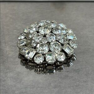 Vintage rhinestone domed shape brooch with clear round and baguette crystals